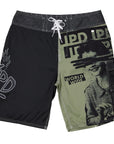 front view of mens faceplant y2k fit 22" boardshort in black showing large IPD on right leg and full graphic covering left leg of women surrounded by IPD logos