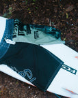 mens faceplant y2k fit 22" boardshort showing the front view and graphics as they lay on surfboard