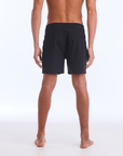 The B100 Chase boardshort features a 16” length and solid black coloring with a black and white striped side taping. It also has a waistband tie, side zipper pocket, and a black IPD logo patch halfway up the left leg taping.