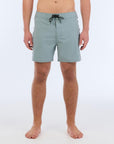 The B100 Chase boardshort features a 16” length and solid sage coloring with a black and white striped side taping. It also has a waistband tie, side zipper pocket, and a black IPD logo patch halfway up the left leg taping.