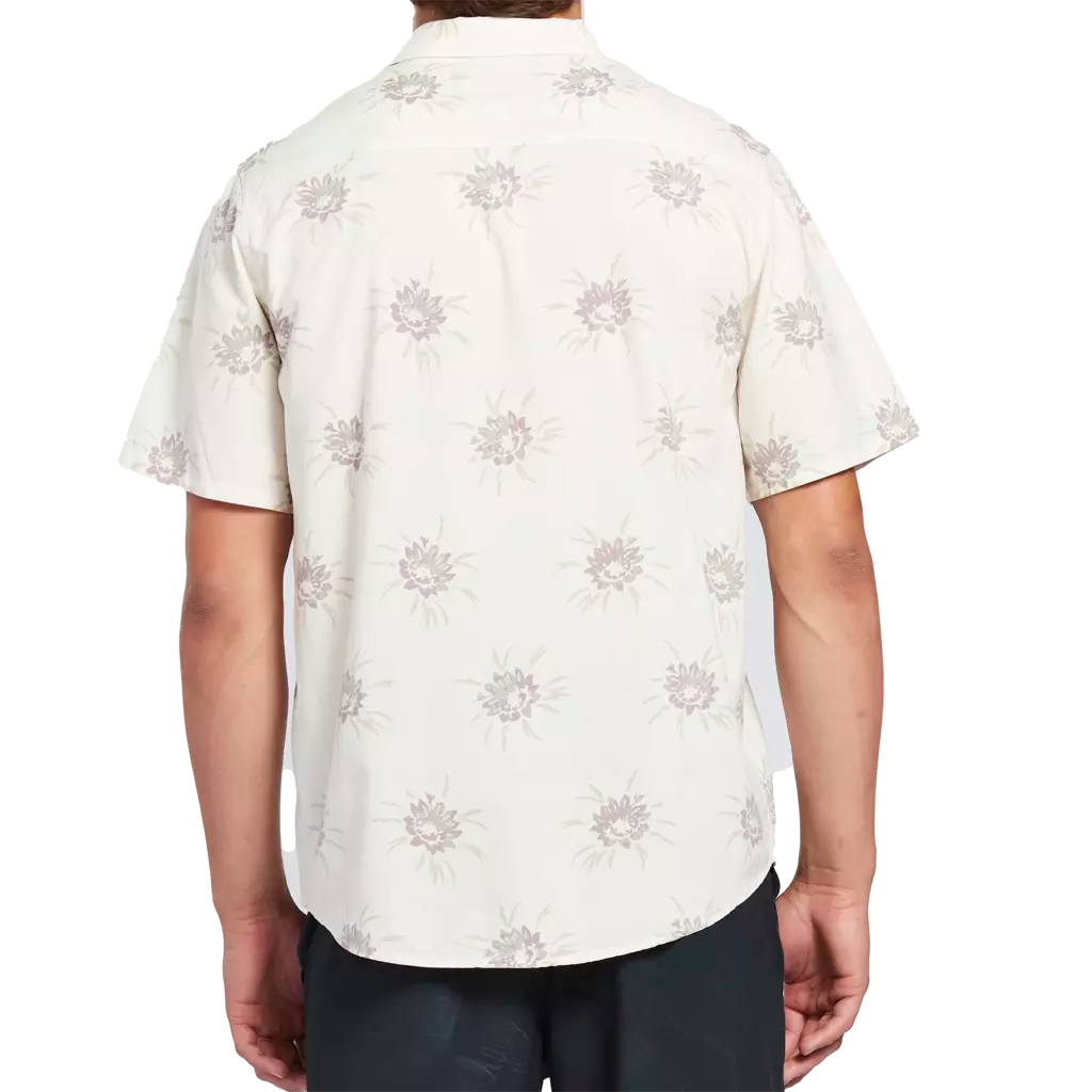 White haze button up short sleeve shirt with floral pattern front.