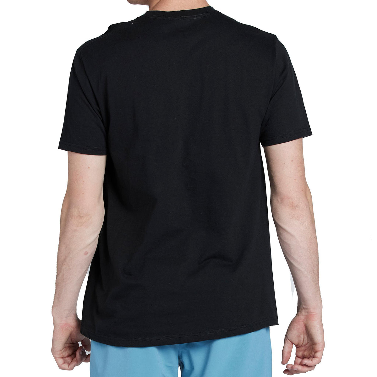model wearing black mens faceplant tee showing the rear side with nothing on it 