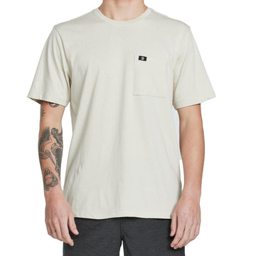 front view of mens foundation pocket tee in haze showing pocket on front left chest with small circular IPD logo on hem 