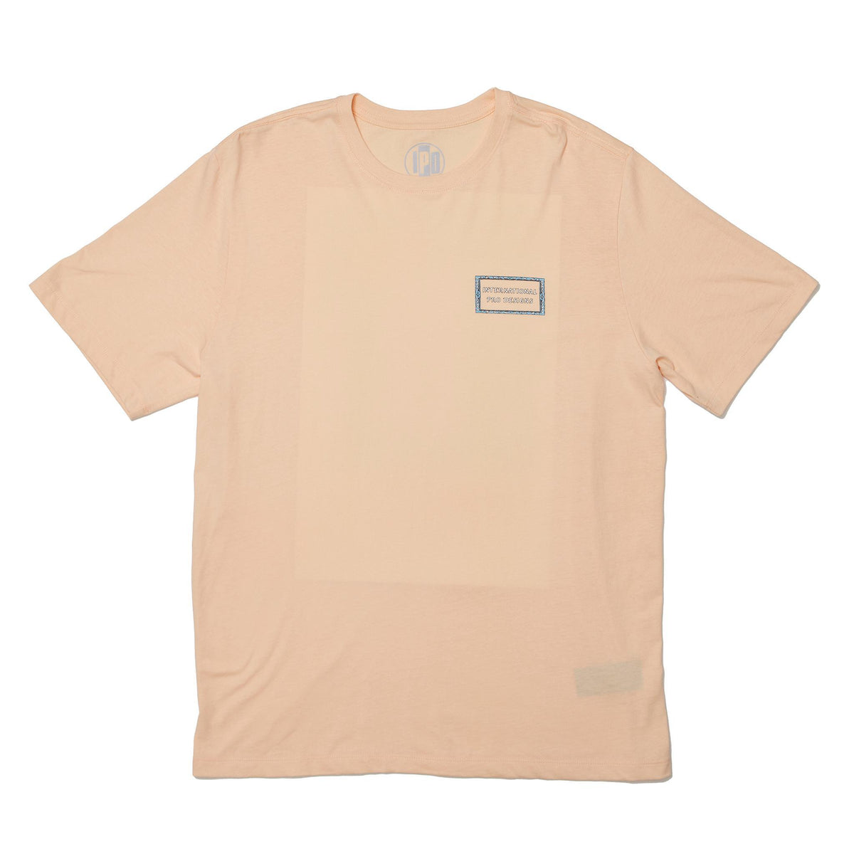 front view of the mens framed super soft s/s tee in color sherbert showing the small frint logos saying international pro designs on the left chest