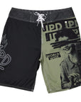 front view of mens faceplant y2k fit 22" boardshort in black showing large IPD on right leg and full  graphic covering left leg of women surrounded by IPD logos 