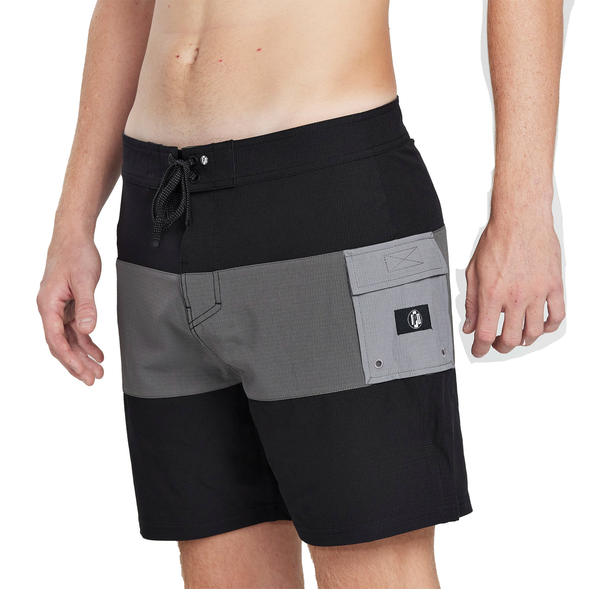 black and gray boardshorts  taken from front side