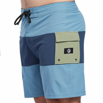 Burnt red boardshorts with a large olive green stripe through the middle and a tan side pocket front view.