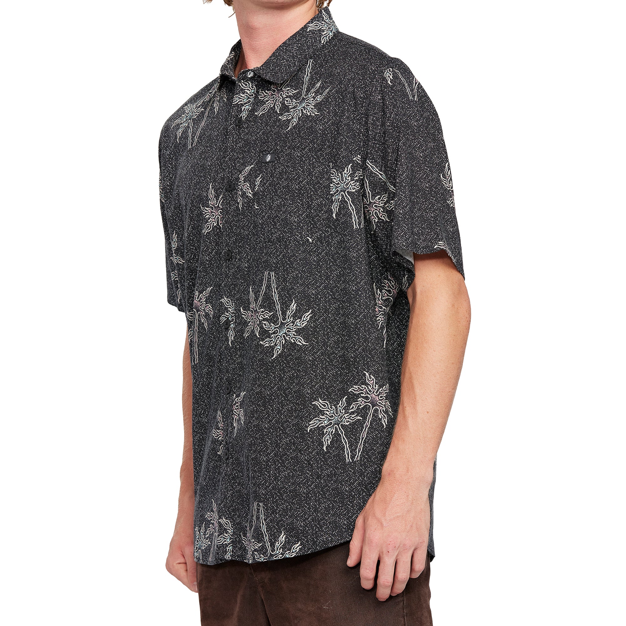 Side view of a black short sleeve shirt with white palm tree print, showcasing the laid-back fit and comfortable style.