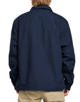 Back view of a man wearing the IPD Dispatch jacket.