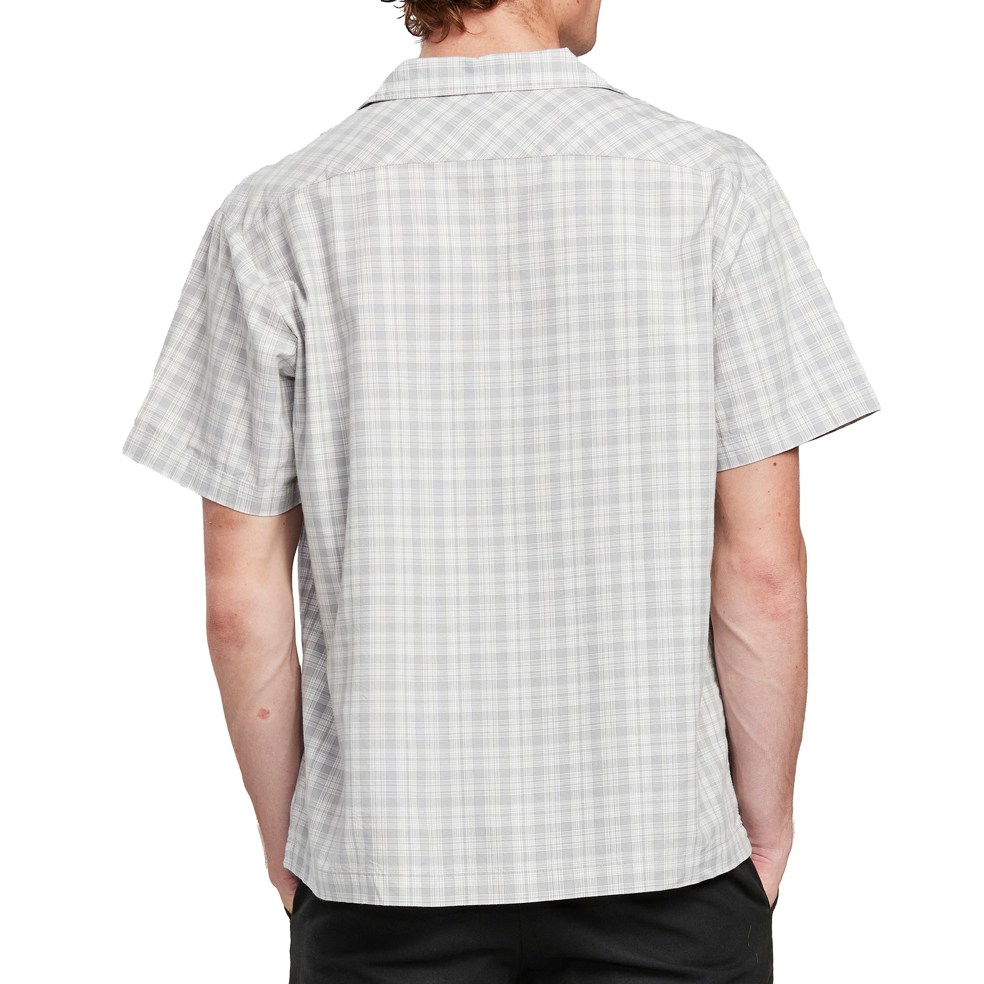 Back view of a man wearing the IPD Knox short sleeve shirt with a plaid pattern.