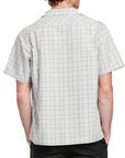 Back view of a man wearing the IPD Knox short sleeve shirt with a plaid pattern.