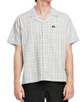 Front view of a man wearing the IPD Knox short sleeve shirt with a subtle plaid pattern.