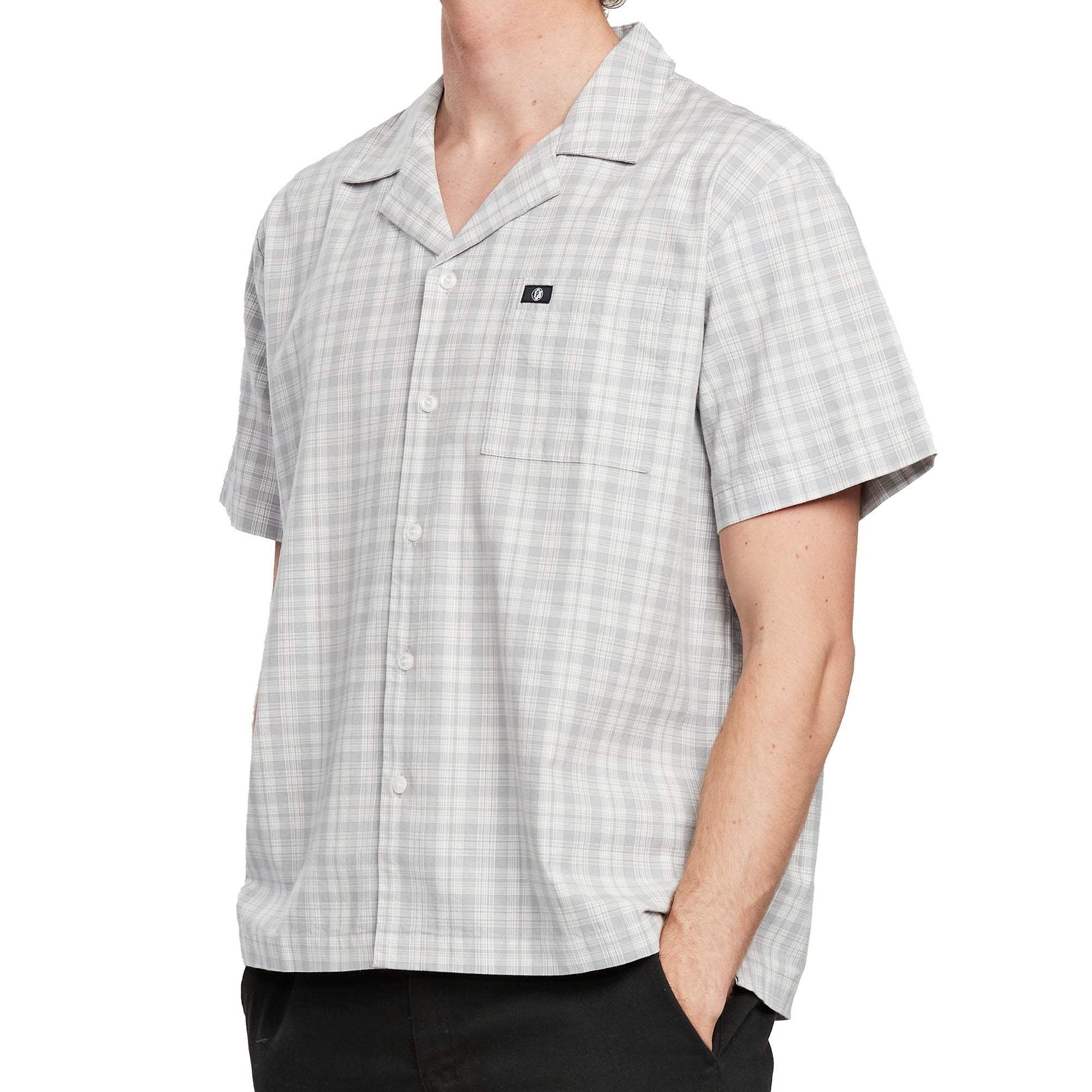 Side view of a man wearing the IPD Knox short sleeve shirt, showing the plaid design.