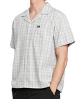 Side view of a man wearing the IPD Knox short sleeve shirt, showing the plaid design.