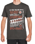 Front view of IPD Surf Everyday graphic tee featuring bold typography and punk rock-inspired design in dark olive. Made from 100% combed ring-spun cotton for ultra-soft comfort.