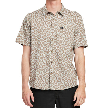 Front view of a man wearing the IPD Rudy short sleeve woven shirt with a floral pattern.