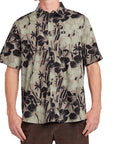 Front view of an olive Hawaiian print short sleeve shirt with black tropical floral designs, offering a casual, yet stylish look ideal for summer.