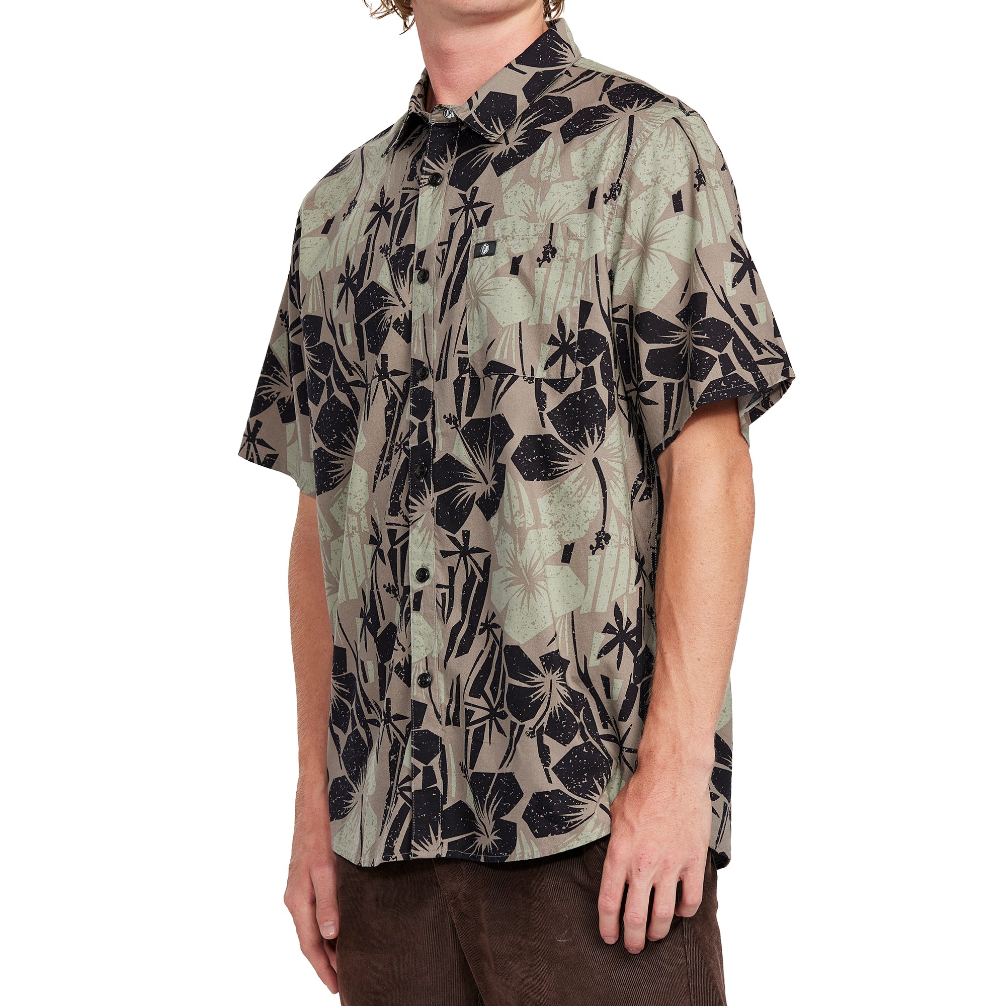 Side view of an olive Hawaiian print short sleeve button-up shirt featuring a bold black floral pattern, perfect for a laid-back tropical vibe.
