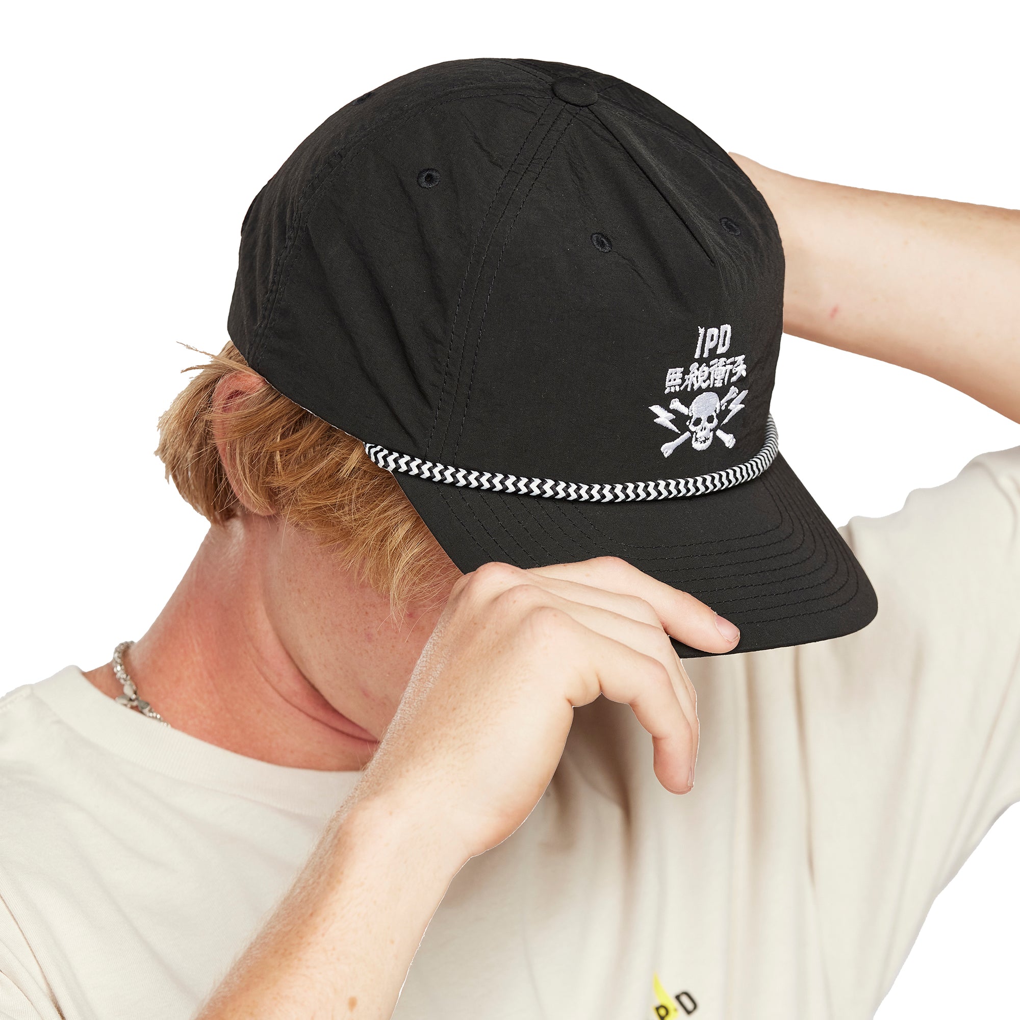 Strummer Nylon Snapback - Side View | Durable Snapback Hat with Braided Rope Detail and Adjustable Back Closure