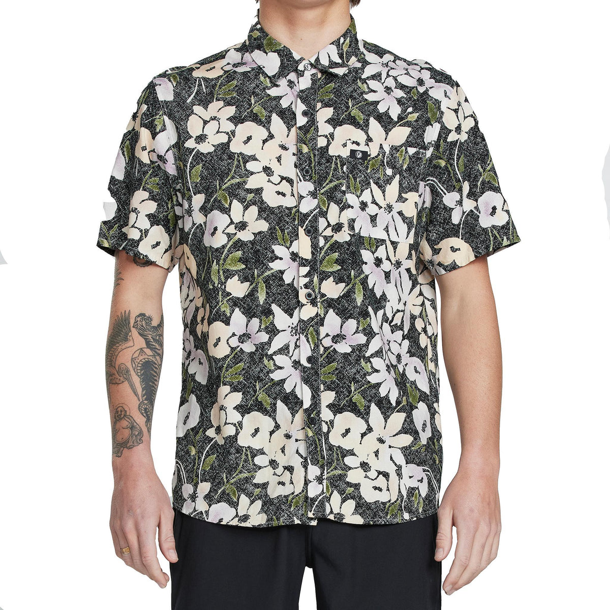 Front view of a men&#39;s short sleeve floral button-down shirt. The shirt features and white and yellow floral pattern against a faded black background. The shirt is neatly buttoned and has a classic collar.