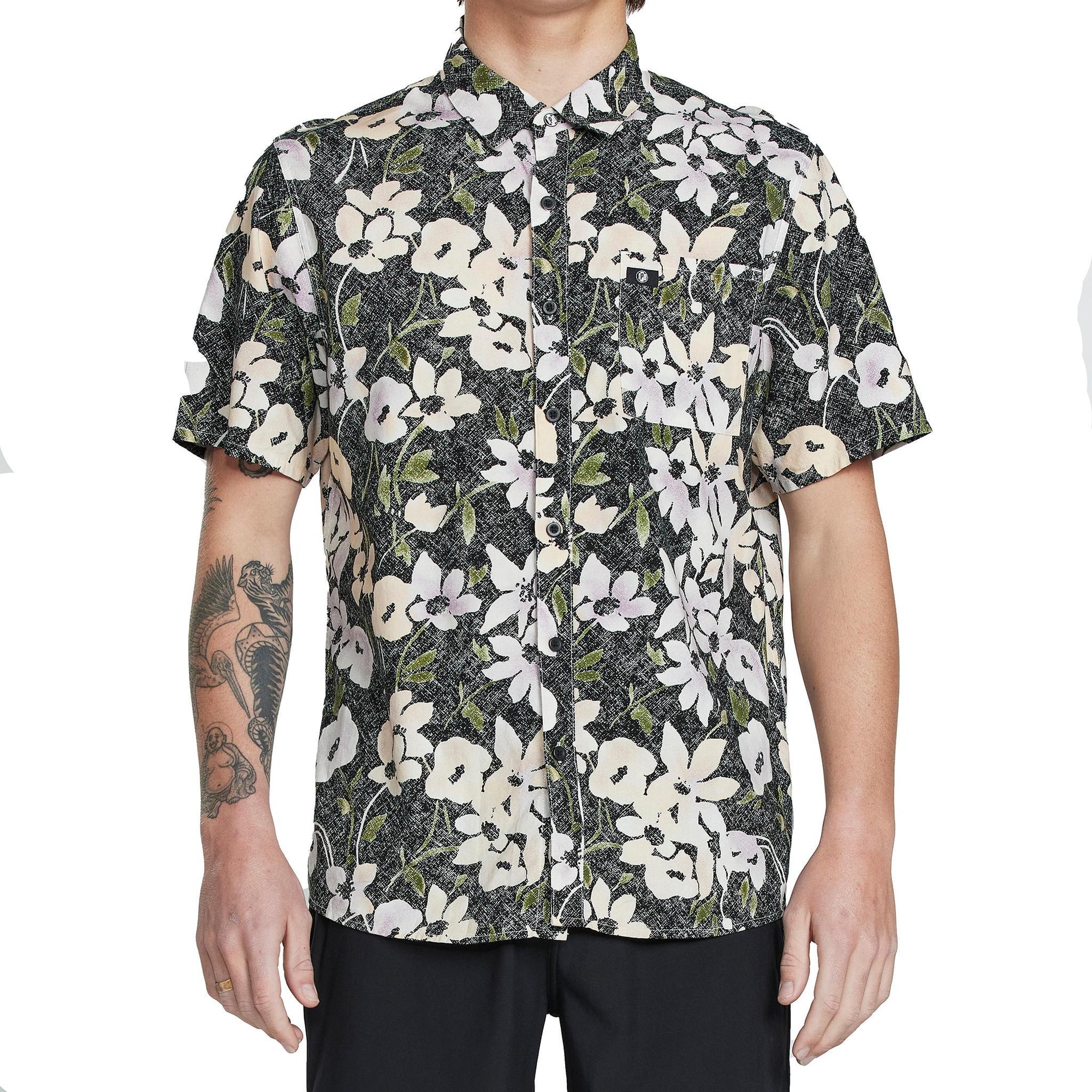 Front view of a men's short sleeve floral button-down shirt. The shirt features and white and yellow floral pattern against a faded black background. The shirt is neatly buttoned and has a classic collar.