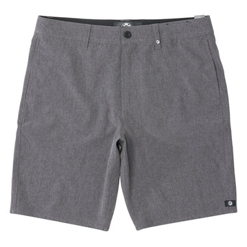 The Carter Hybrid features a 19” length in a classic walkshort silhouette in a waterproof fabric. The base color of the short is a heathered gray. The short also features belt loops, a zipper and button closure, two side pockets and two back pockets, and the signature smaller IPD flag label on the lower left leg.