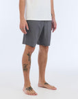 The Carter Hybrid features a 19” length in a classic walkshort silhouette in a waterproof fabric. The base color of the short is a heathered gray. The short also features belt loops, a zipper and button closure, two side pockets and two back pockets, and the signature smaller IPD flag label on the lower left leg.