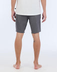 The Carter Hybrid features a 19” length in a classic walkshort silhouette in a waterproof fabric. The base color of the short is a heathered gray. The short also features belt loops, a zipper and button closure, two side pockets and two back pockets, and the signature smaller IPD flag label on the lower left leg.