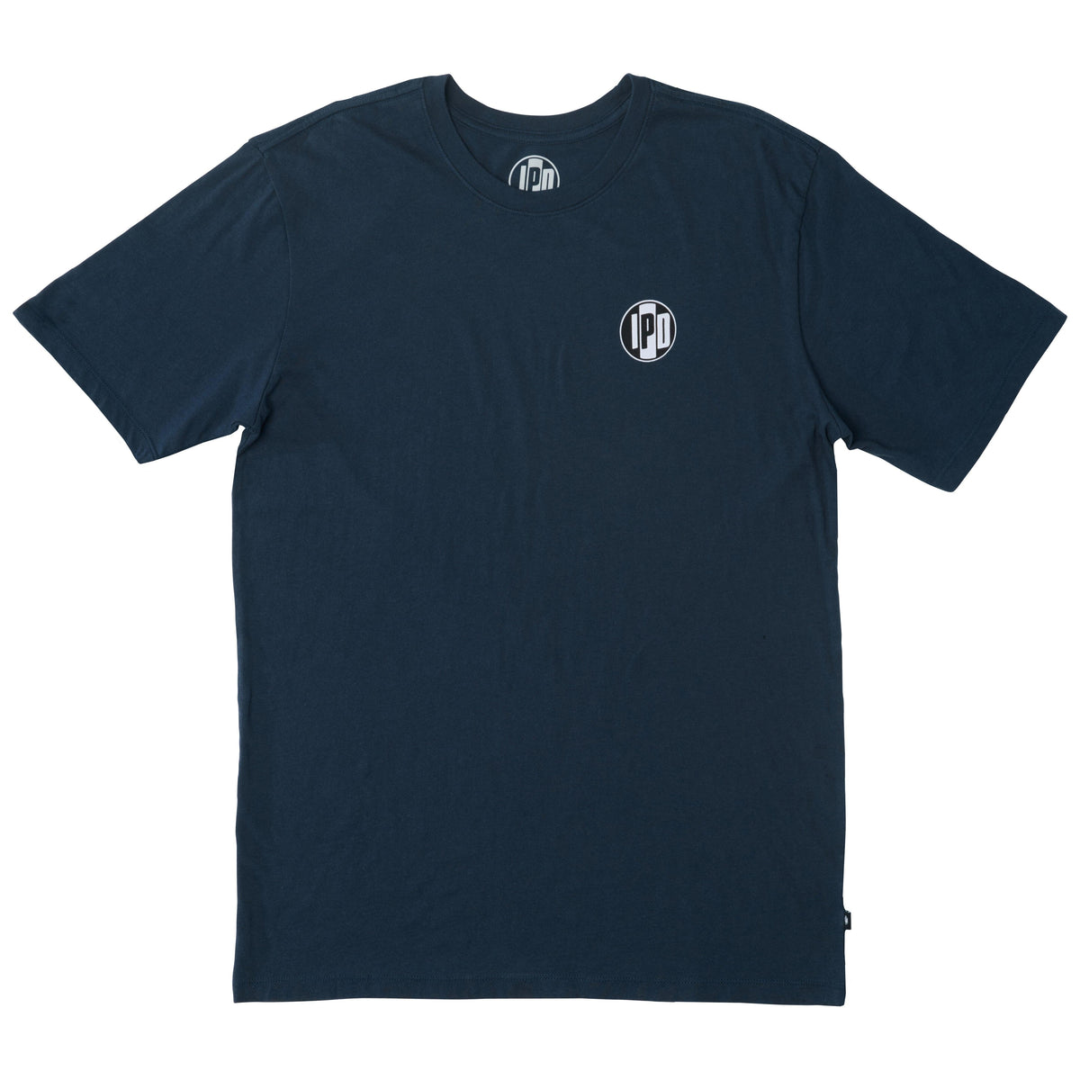 The Surf Shop Super Soft Tee has a left chest front graphic of the IPD logo in black and light blue. The back pictures a hand-drawn depiction of a surf shop across the upper middle back of the shirt. The body color of the shirt is navy and the graphic color is multicolored and has a small black side seam label with the IPD logo.