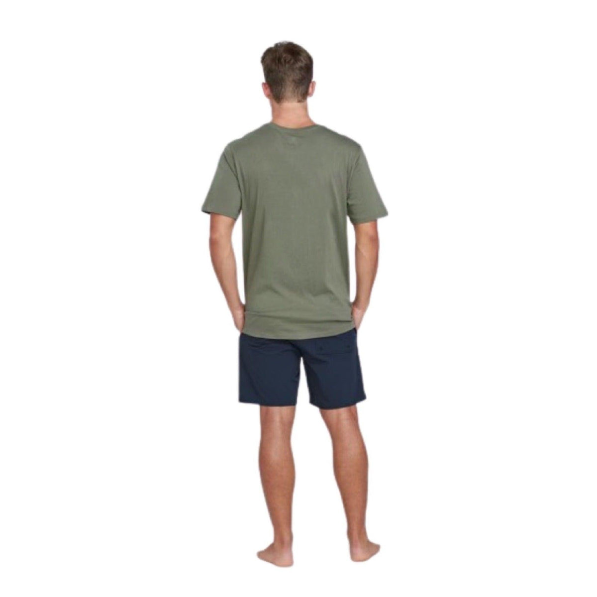 The back view of a man wearing an olive-colored, short-sleeved shirt.